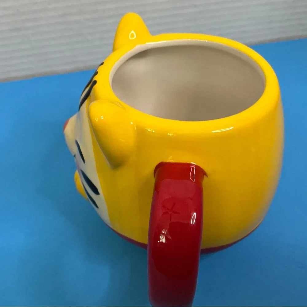 Playful Yellow Cat Face Ceramic Mug with Red Handle